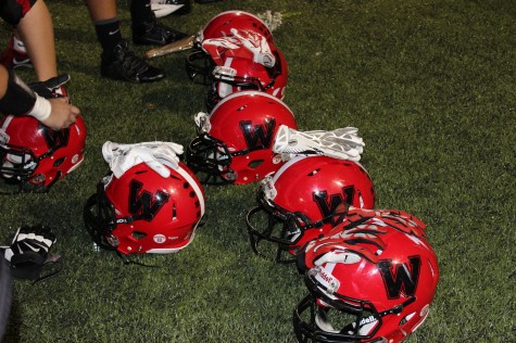Gear awaits the Watertown High School football team prior to its Senior Night game with Melrose on Oct. 10, 2014.