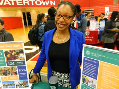 Shary Browne representing Pine Manor College at the Watertown High School's annual College Fair on Oct. 9, 2014. 