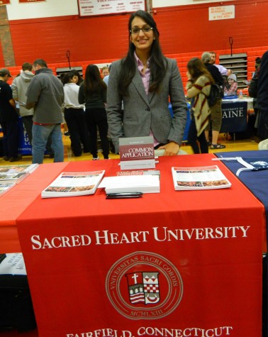 Shivani Sood representing Sacred Heart University at the annual College Fair at Watertown High School on Oct. 9, 2014. 