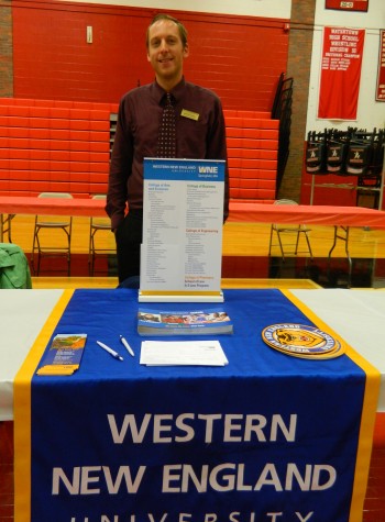 Michael Russell representing Western New England University at the College Fair at Watertown High on Oct. 9, 2014. 