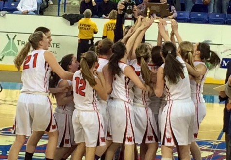 The Watertown girls' basketball team celebrates their Division 2 North championship at Tsongas Center in Lowell on Saturday, March 7, 2015. Watertown defeated Pentucket, 44-40, to advance to the MIAA's Eastern Mass. title game against undefeated Duxbury on Tuesday, March 10, at TD Garden.  
