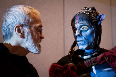 Cirque du Soleil director Michel Lemieux (left) has a close-up view of the intricate makeup and design worn by the performers in the new production, "Toruk: The First Flight."