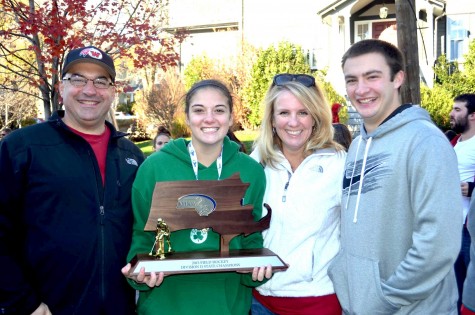 Michaela Antonellis celebrates with her family after the Watertown field hockey team won the MIAA Division 2 state championship on Saturday, Nov. 21, 2015, in Worcester. The Raiders beat Auburn, 6-0, for their seventh straight MIAA state championship while extending their national-record unbeaten streak to 160 games.