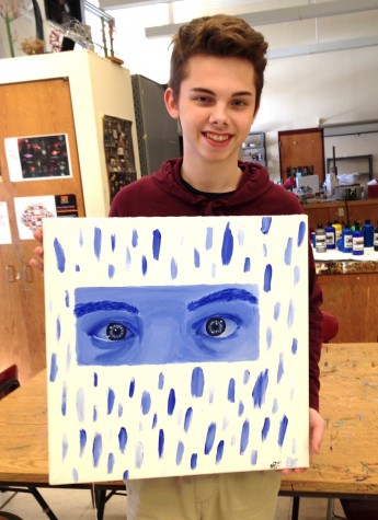 Noah Prior of the Watertown High studio art class poses with his work that will be displayed in the show "Here I Am" at Room 83 Spring Gallery in Watertown, Mass., from Feb. 4-27, 2016.