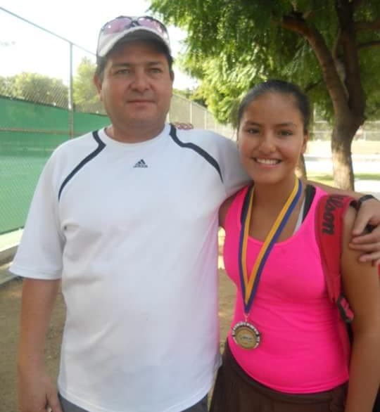 Lilian Marr Calderon, the newest member of the Watertown High tennis team, poses with her father in Mexico.