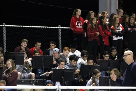 Dan Jordan (lower right) and the WHS Pep Band energized the Victory Field crowd as the Raiders beat Plymouth South, 24-6, on Sept. 16, 2016.