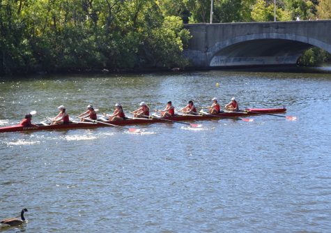 The novice girls competitive team from Community Rowing Inc. gets its work in on the Charles River.