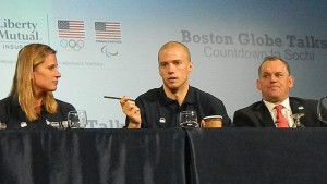 Angela Ruggerio, a four-time US Olmpic medalist and Charlie Huebner, chief of paralympics for the US Olympic committee, listen to Patrick Meek, a speed skater who will be representing Team USA in the 2014 Games, during the Countdown to Sochi panel discussion at the Park Plaza Hotel in Boston on Jan. 10, 2014.