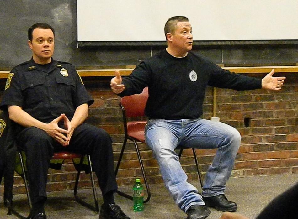 Sergeant John MacLellan (right)  talks about the events of April 19, 2013, during a visit to Watertown High School on March 10, 2014.  Watertown Police Lieutenant James OConnor is at left.