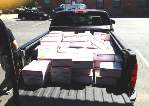 A truckload of care packages ready for shipment gathered by Operation American Soldier, a non-profit based in Watertown, Mass.
