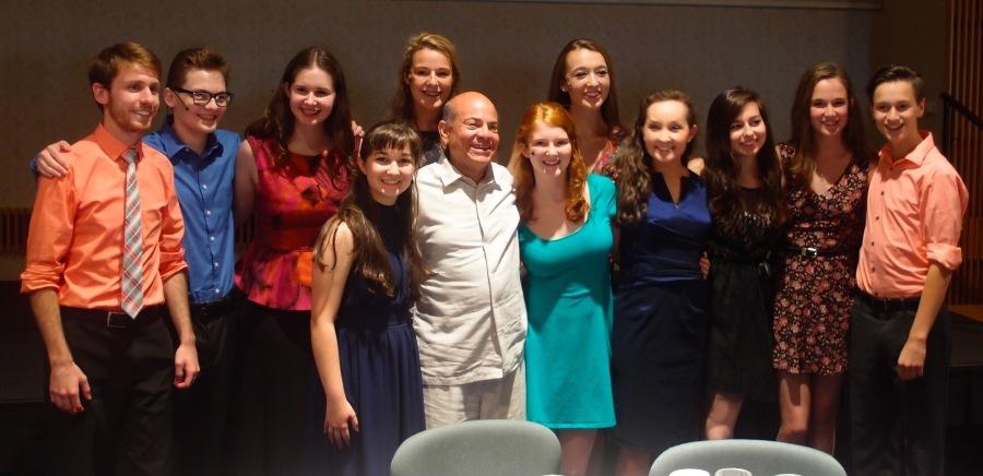 Arno Selco (center) and accompanist Dave Klodowski (left) pose with their Musical Theater summer class at Ithaca College.