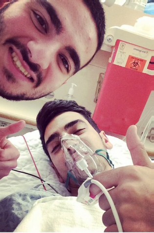 Chris Keikian (left) poses with his brother after Joe's recent surgery.