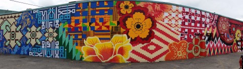 The completed mural, Tapestry of Cultures, on Baptist Walk in Watertown Square, as painted by Watertown High School students in the summer of 2014.