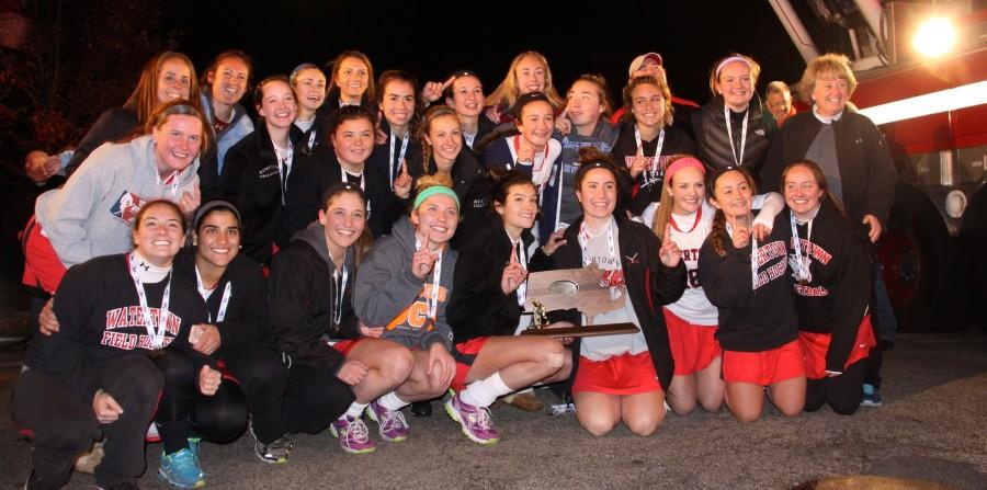 The Watertown High School field hockey team receives a heros welcome put on by the Watertown Fire Department after winning the 2014 Division 2 state title at Worcester Polytechnic Institute on Sunday, Nov. 16, 2014. The Raiders defeated Auburn, 5-0, to complete their season 23-0 and extend their unbeaten streak to 138 games. 