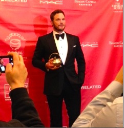 Chris Pratt, Hasty Pudding's Man of the Year, poses for reporters and photographers at the Man of the Year roast on Feb. 6, 2015.
