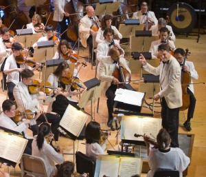 Keith Lockhart (right) begins his 20th year conducting the Boston Pops at Symphony Hall in Boston on Wednesday, May 6, 2015, a concert that featured singer Bernadette Peters.