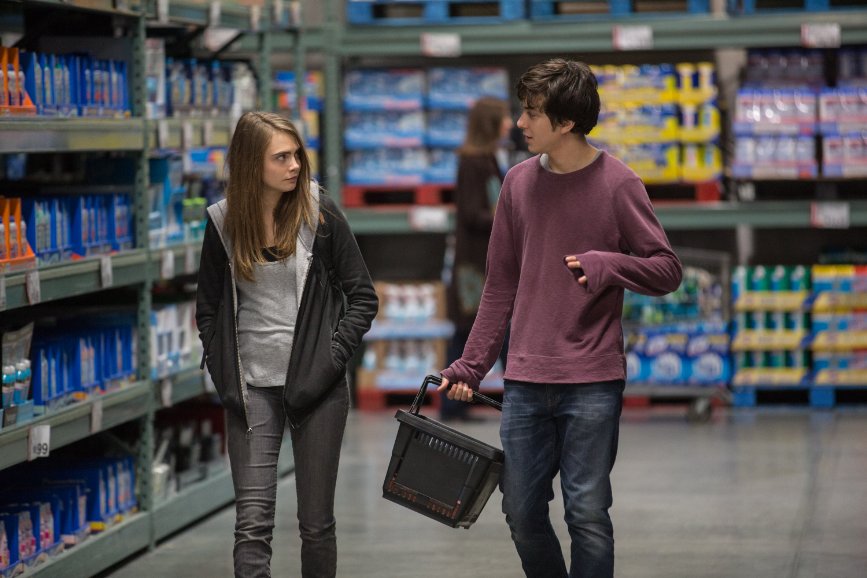 Cara Delevingne (left) and Nat Wolff star in the film adaptation of Paper Towns by author John Green. 