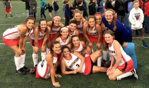 The 2015 Watertown High School field hockey team takes a moment for itself after its record-setting 6-0 victory over Melrose on Oct. 21 at Victory Field. 