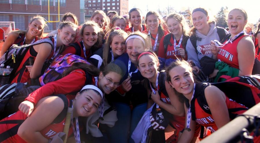 Members of the Watertown field hockey team celebrate after winning the MIAA Division 2  state championship on Saturday, Nov. 21, 2015, in Worcester.
