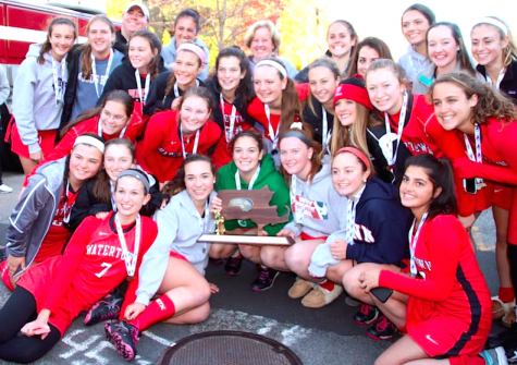 Members of the Watertown field hockey team celebrate after winning the MIAA Division 2 state championship on Saturday, Nov. 21, 2015, in Worcester. The Raiders beat Auburn, 6-0, for their seventh straight MIAA state championship while extending their national-record unbeaten streak to 160 games.
