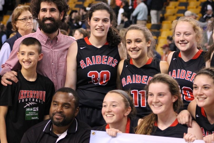 Coach Pat Ferdinand (bottom left) and the Watertown High girls basketball team won the 2016 EMass title at TD Garden.