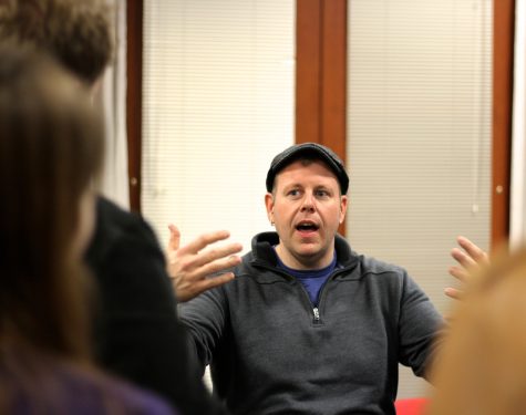 Mike Snow, founder of the Boston Calling Music Festival, talks with journalism students from Boston-area high schools during a music panel at the Boston Globe.