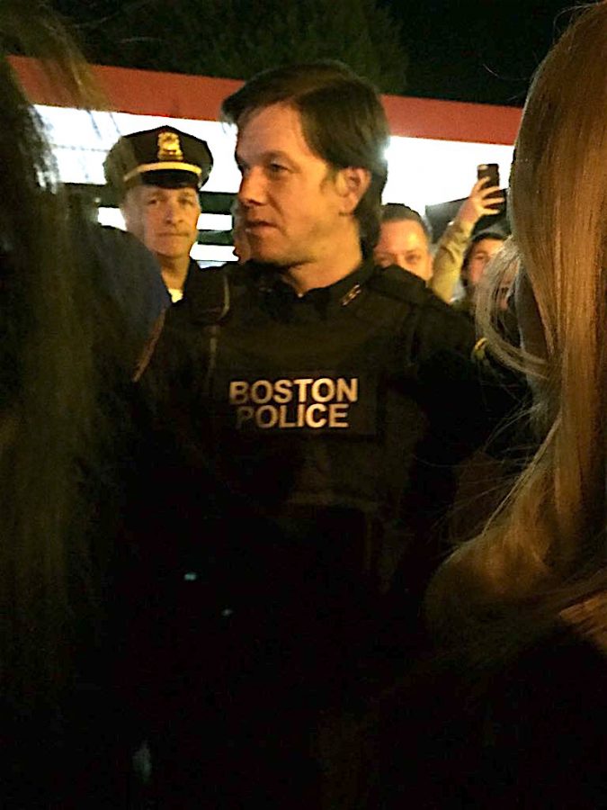 Mark Wahlberg greets fans in Watertown after shooting a scene for Patriots Day at Main Street Mobile on May 9, 2016.