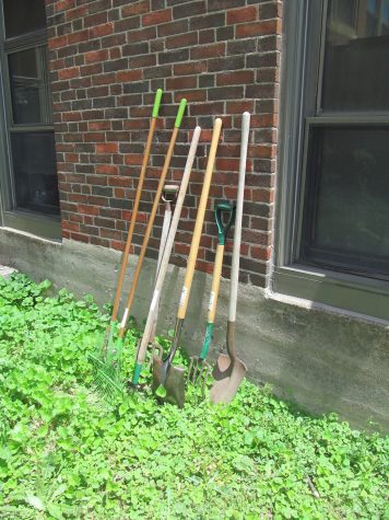 Gardening tools take a break in the Watertown High School courtyard in the spring.
