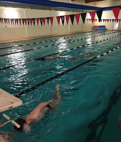 The pool inside the Watertown Boys and Girls Club is busy at 5 a.m. with practice going on for the Crimson Aquatics swim team.