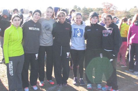 The Watertown High girls' cross-country team poses at the MIAA Divisional Cross-Country Championships at Wrentham Development Center Nov. 12, 2016. 