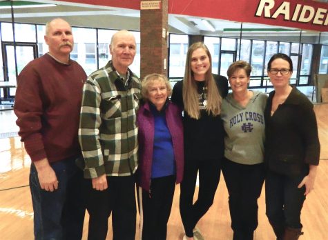 Shannon Murphy (third from right) and her family pose during a letter of intent signing ceremony held Thursday, Nov. 10, 2016, at Watertown High School.