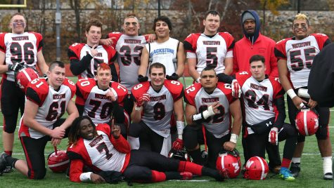 The victorious Raiders pose after Watertown defeated host Belmont, 34-28, in their annual Thanksgiving game on Nov. 24, 2016.