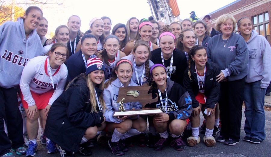The Watertown High School field hockey team poses with the MIAA Division 2 state title on Nov. 19, 2016. The Raiders defeated Oakmont, 4-3, at WPI for their eighth straight state championship.