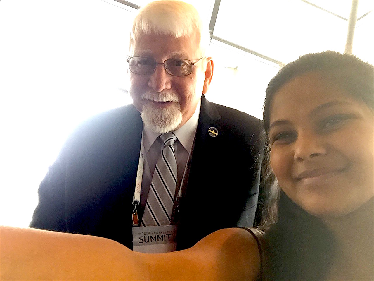 Danny Bentley (left), a state Representative from Kentucky, poses with a reporter at the National Conference of State Legislators’ 2017 Legislative Summit at Boston Convention Center in August.