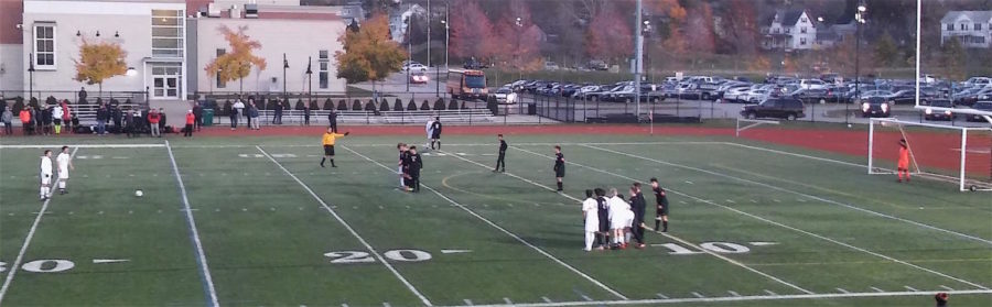 Watertown (in black) and Wayland battle in the first half of the Division 3 North boys soccer semifinals Wednesday, Nov. 8, 2017, at Woburn High. After a scoreless draw, Watertown won on penalty kicks, 5-4, to advance to Sundays sectional final. 