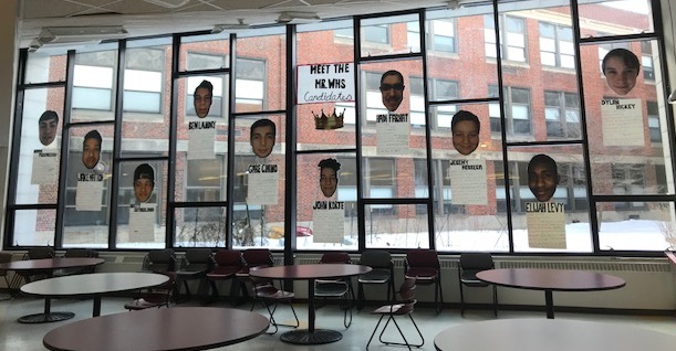 The oversized faces of the 10 competitors for the crown of Mr. WHS  are displayed in the Watertown High cafeteria. This years contest is Tuesday, March 20, at 6 p.m.