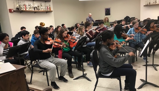 The full Watertown High School orchestra rehearses on Friday, March 2, 2018, in preparation for the annual Bandarama concert to be held Tuesday, March 6, in the WHS gym starting at 7 p.m.