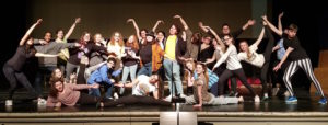 The cast of Pippin takes a break from rehearsal to pose for a picture. The cast will be on the Watertown High stage for real for three shows, March 15-17, 2018, with curtain each night at 7 p.m. 