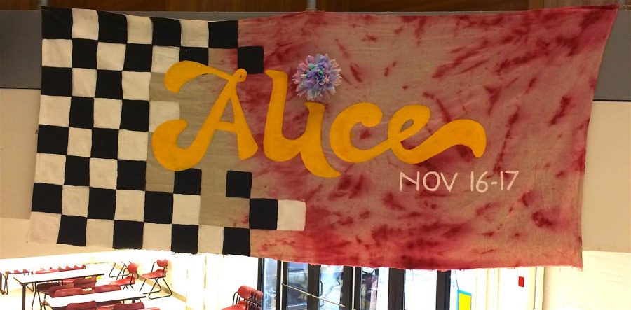 One of the posters promoting the fall play, Alice in Wonderland, hangs near the cafeteria stairs at Watertown High School. The play will performed three times Nov. 16-17, 2018.