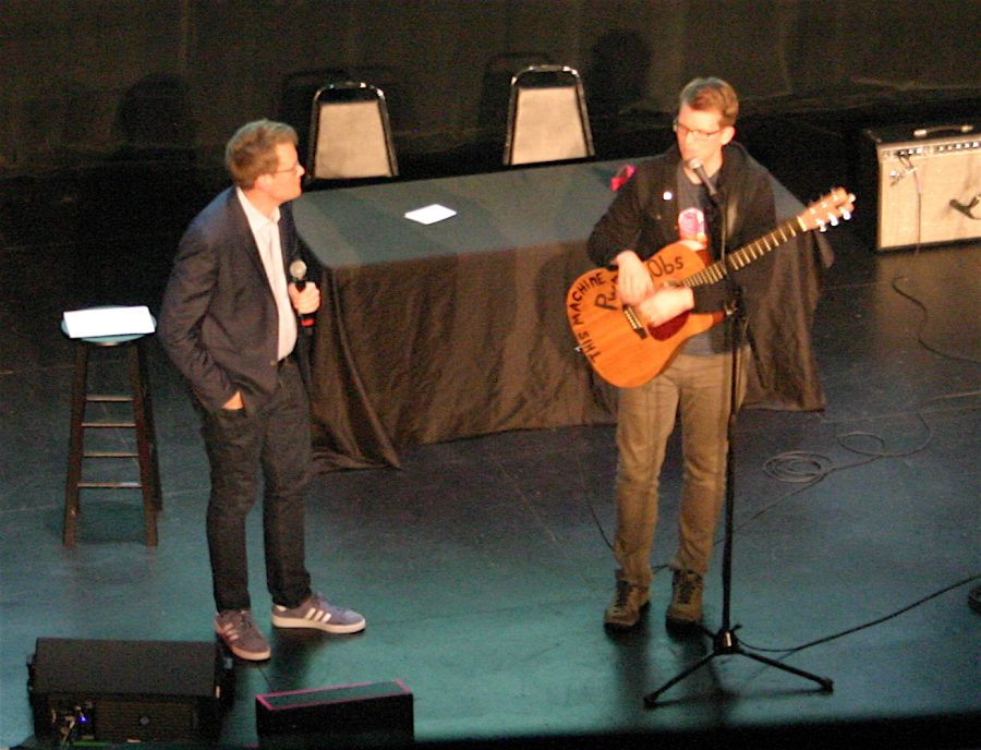 John Green (left) and brother Hank Green on stage at Bostons Wilbur Theatre on Sept. 26, 2018, as part of the promotional tour for Hanks debut book, An Absolutely Remarkable Thing.