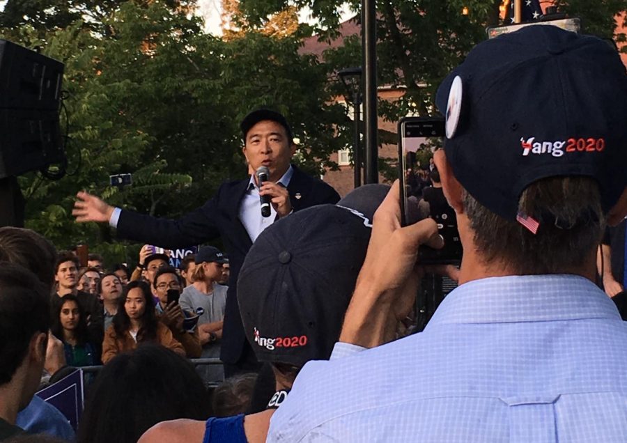Andrew Yang, one of the Democratic candidates of president, addresses the crowd on Cambridge Common during a campaign stop Monday, Sept. 16, 2019.