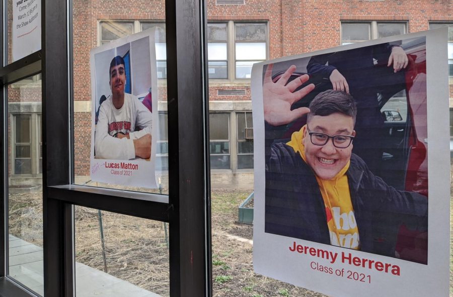 Photos of contestants in this years edition of Mr. WHS line the windows of the Watertown High School cafeteria. 