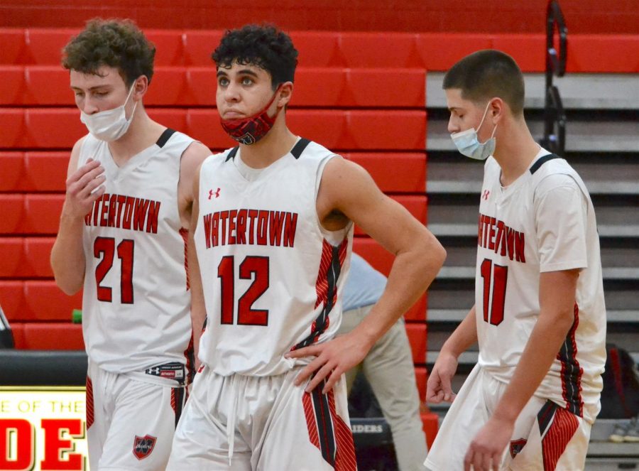 The Watertown boys basketball team advanced in the Middlesex League playoffs with a 75-57 victory over visiting Lexington on Feb. 17, 2021.
