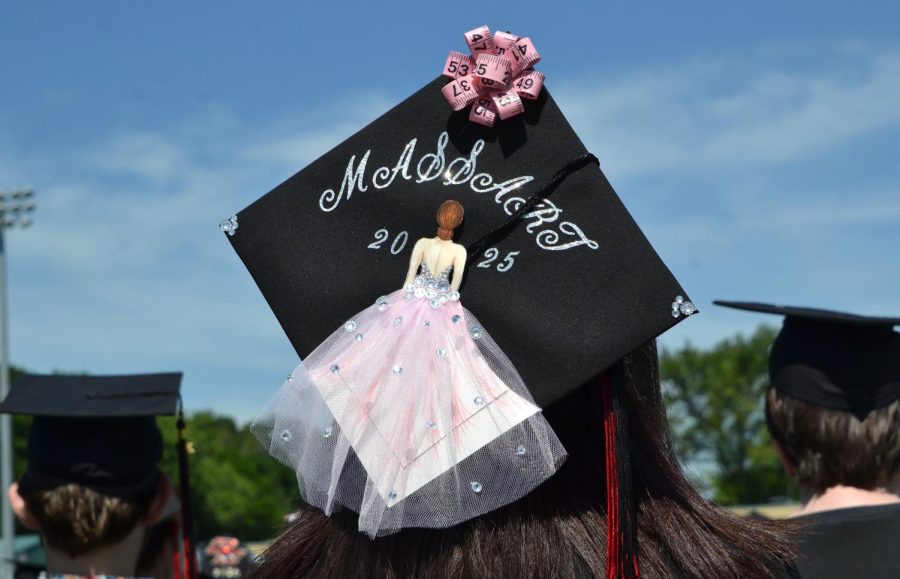 Students+in+the+Class+of+2021+added+individual+design+touches+to+their+caps+and+gowns+for+the+Watertown+High+School+graduation+on+June+5%2C+2021%2C+at+Victory+Field.+