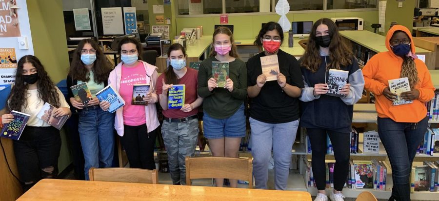 Members of the Book Club at Watertown High School pose before a meeting this fall.