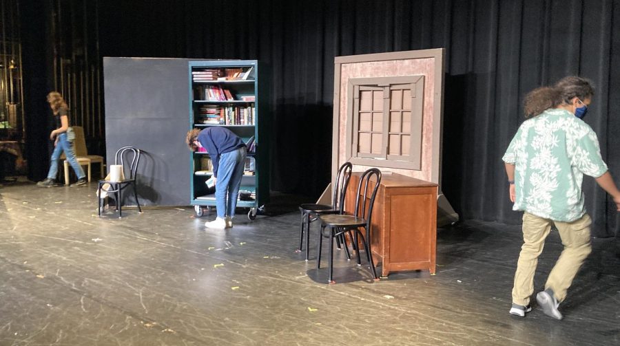 The cast and crew of Get Smart at Watertown high School began rehearsal Tuesday, Nov. 17, 2021, by setting up the set with props made during tech week.

