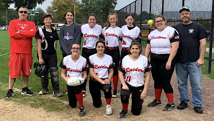 Players and coaches of the 18U Watertown Raiders softball team pose at their second game.


