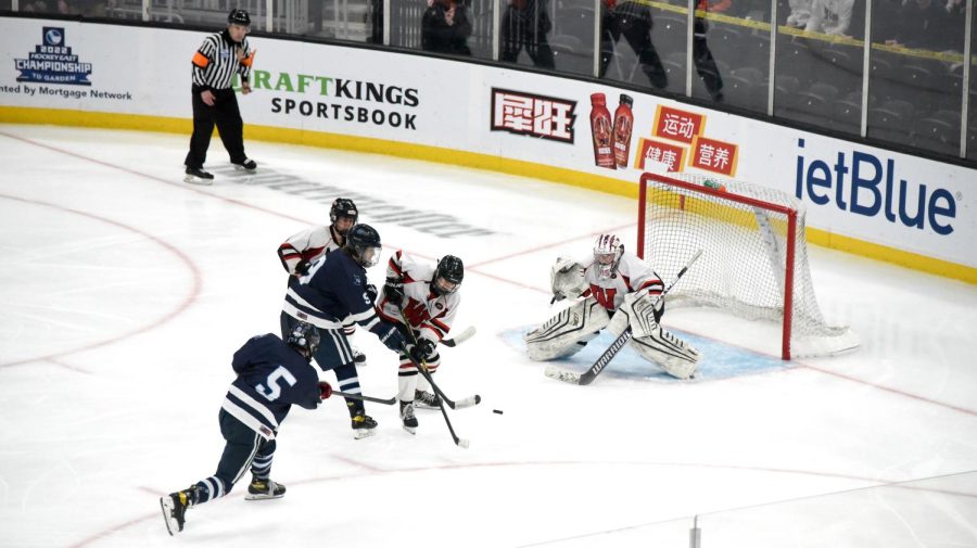 Jack Connolly (5) lets fly the winning goal, giving Sandwich a 3-2 victory over Watertown in double overtime and the MIAA Division 4 state title at TD Garden on Sunday, March 20, 2022.